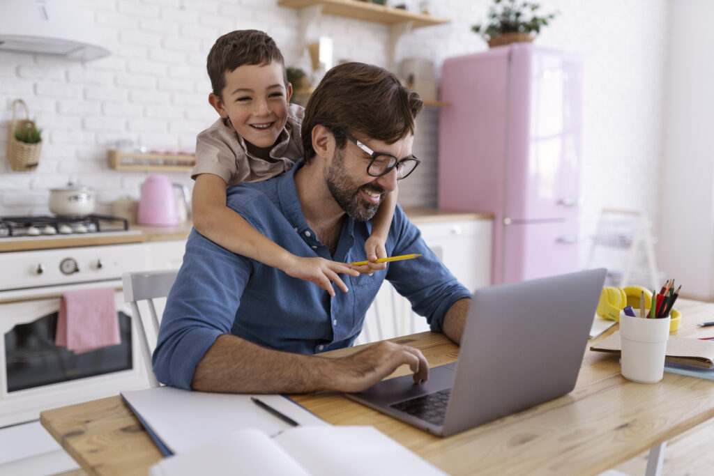 Father's Day Gifts That Actually Matter (2025 Guide) 7 Tech savvy dad with his son