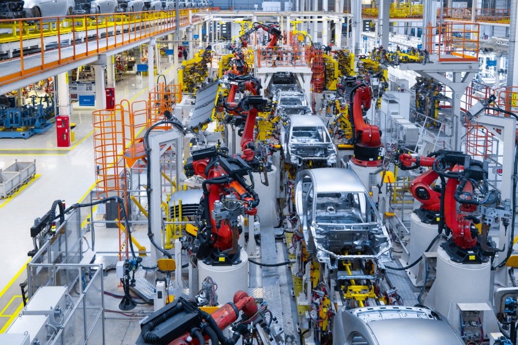 Ford’s Big EV Gamble to Transform Truck Production 6 assembly line production new car automated welding car body production line robotic arm car production line is working