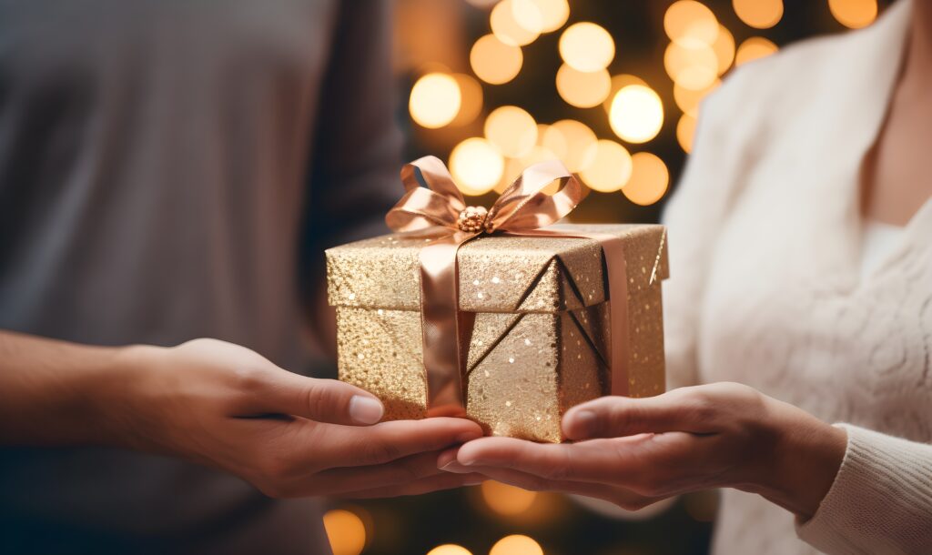 How to Choose the Perfect Christmas Gift for Your Loved Ones 6 Couple celebrating christmas together and sharing Christmas gift