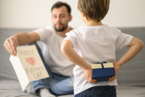 Kid surprising dad with gift