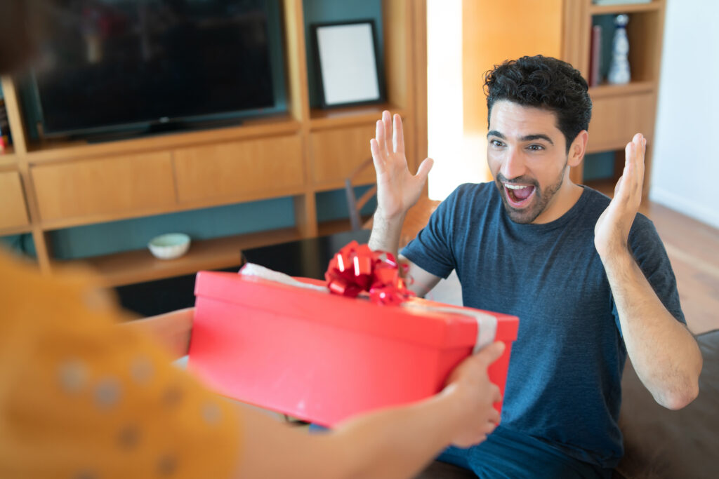 The #1 Anniversary Gift That Broke The Internet 6 Surprised Man with his anniversary gift